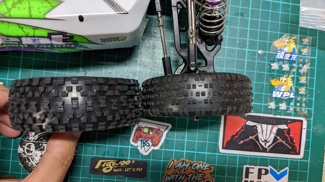 Порівняння штатних і збільшених коліс WLtoys 104001