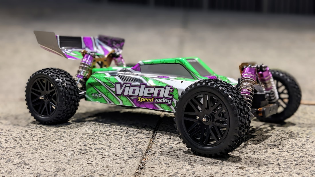 WLtoys 104001 із більшими позашляховими колесами