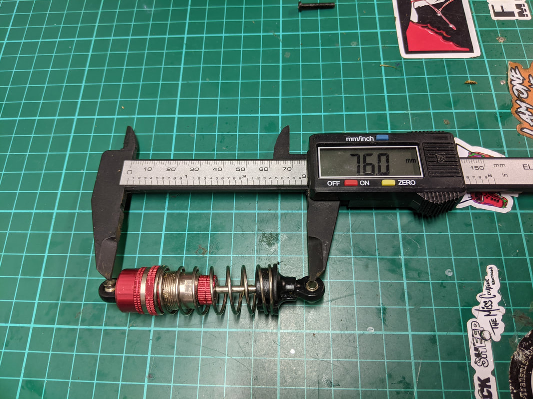 Довжина переднього амортизатора WLtoys 104001