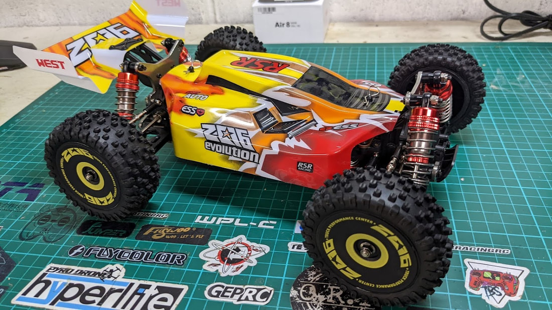 Передавач WLtoys із синім кермовим колесом